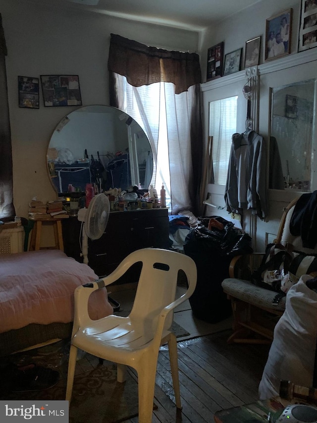 dining room with wood-type flooring