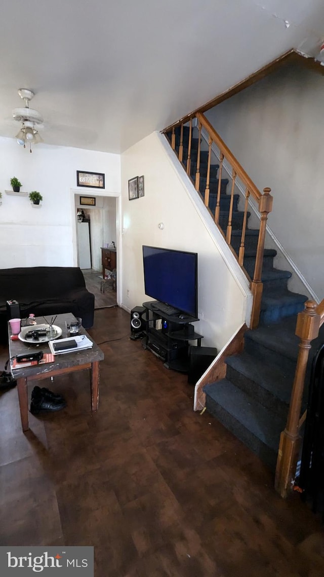 living room featuring ceiling fan