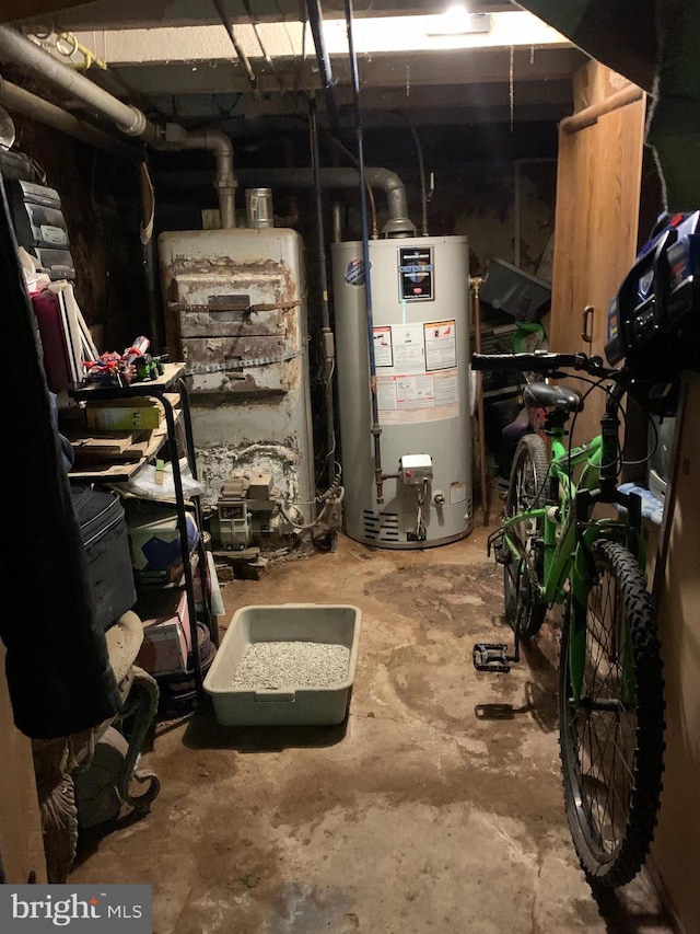 utility room featuring water heater