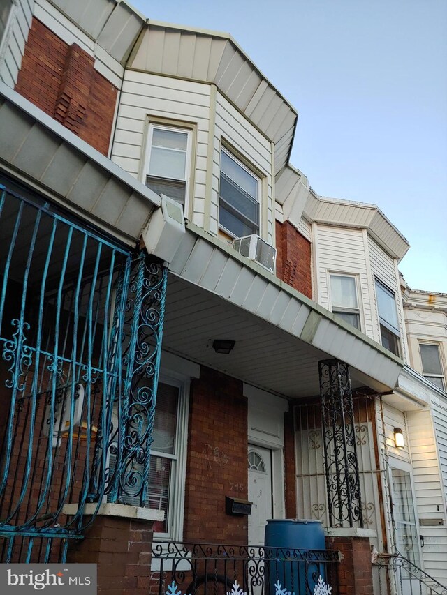 view of property with a porch