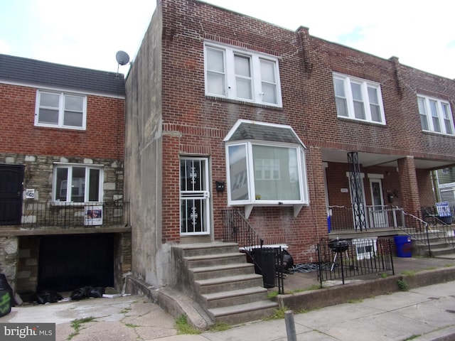 view of property with covered porch