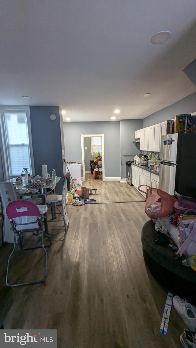 interior space with hardwood / wood-style floors