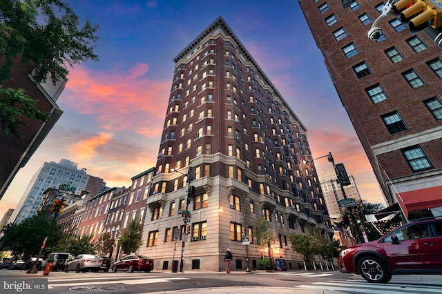 view of outdoor building at dusk