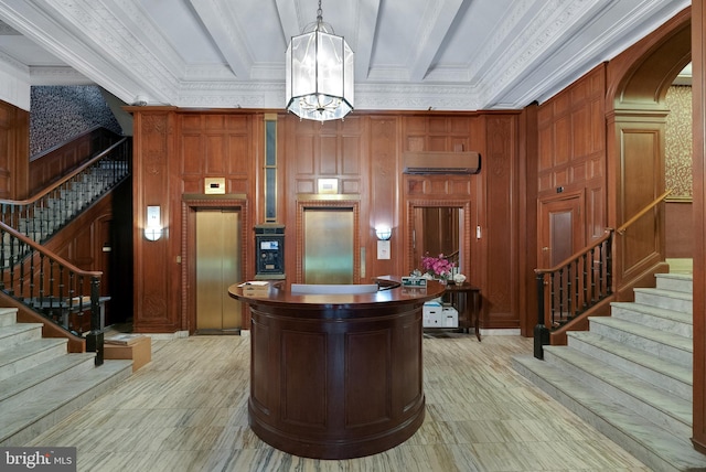 bar featuring pendant lighting, wood walls, ornamental molding, elevator, and an inviting chandelier