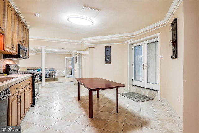 kitchen featuring ornamental molding, black appliances, french doors, and light tile patterned floors