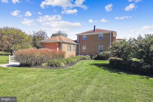 exterior space featuring a lawn