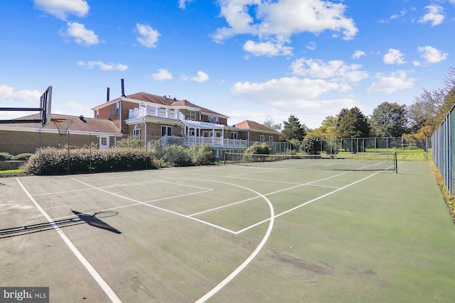 view of sport court with tennis court