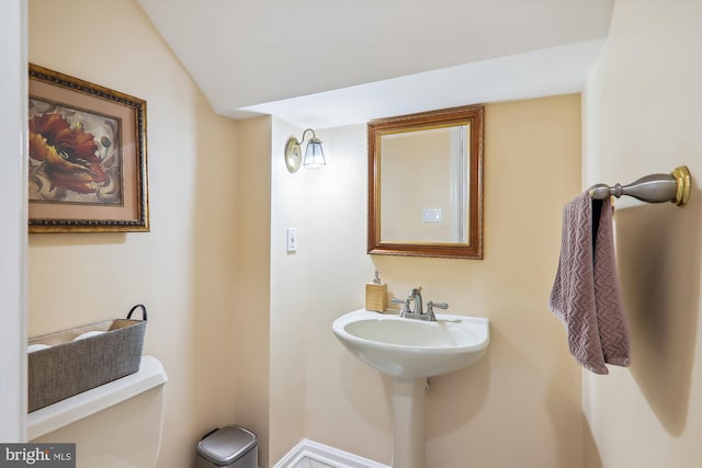 bathroom with sink and toilet