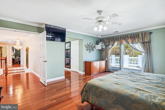 bedroom featuring wood-type flooring, crown molding, access to exterior, and ceiling fan