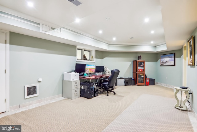 home office featuring light colored carpet and a raised ceiling