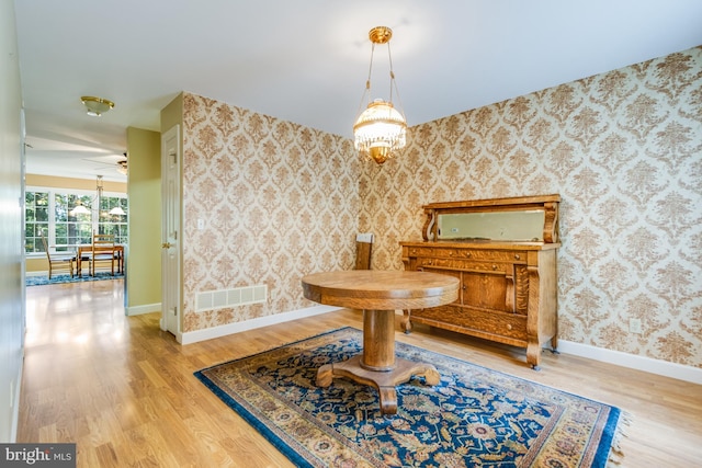 interior space with hardwood / wood-style flooring and ceiling fan