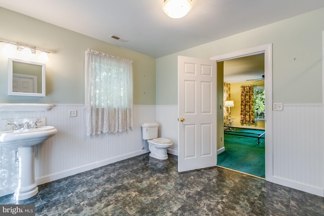 bathroom featuring sink and toilet