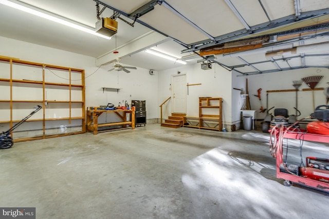 garage featuring a garage door opener and ceiling fan