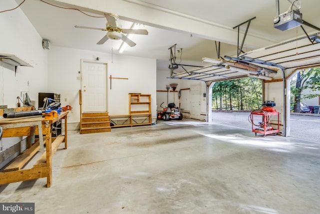 garage featuring ceiling fan and a garage door opener