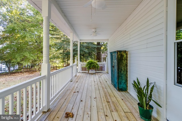 deck with covered porch and ceiling fan