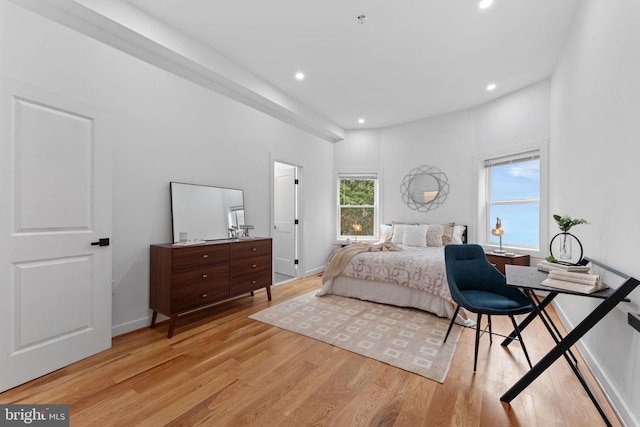 bedroom with light hardwood / wood-style floors