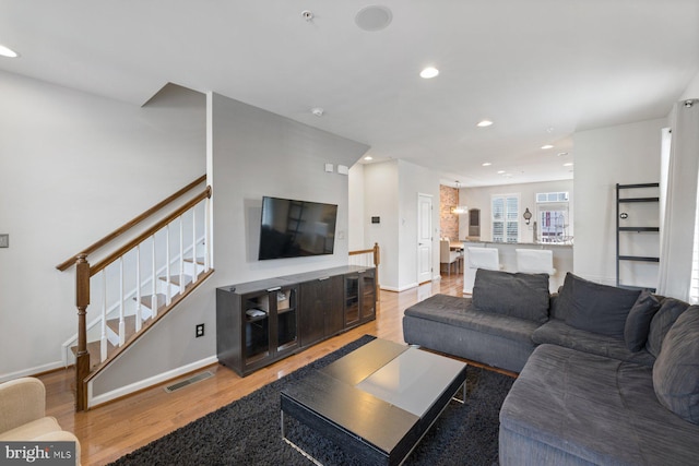 living room featuring light wood-type flooring