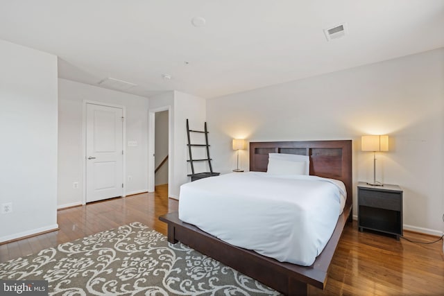 bedroom featuring hardwood / wood-style floors