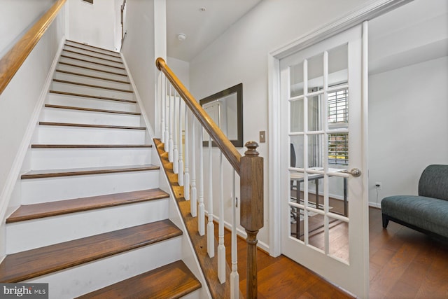 stairs with wood-type flooring