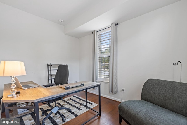 office with dark hardwood / wood-style flooring