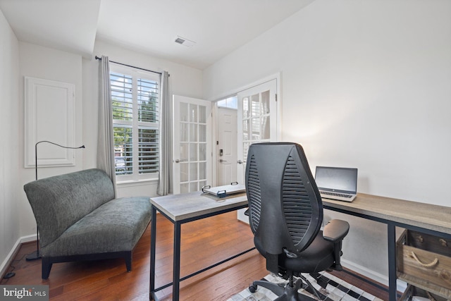 office with hardwood / wood-style flooring