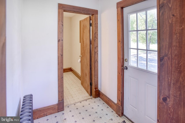 doorway to outside with radiator