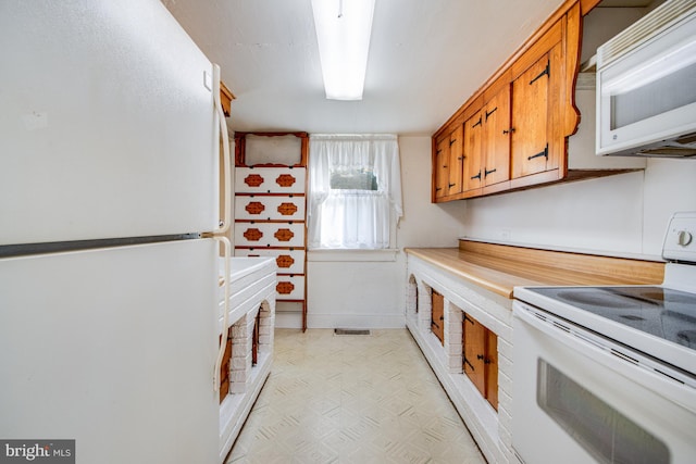 kitchen featuring white appliances