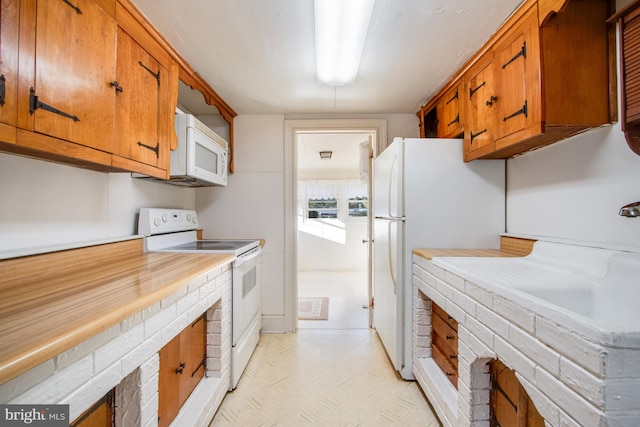 kitchen featuring white appliances