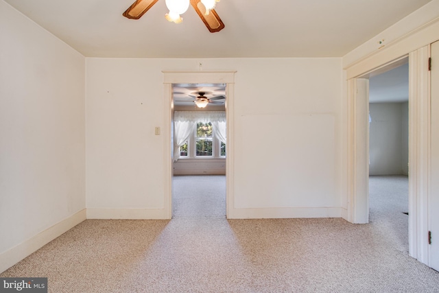 spare room with ceiling fan