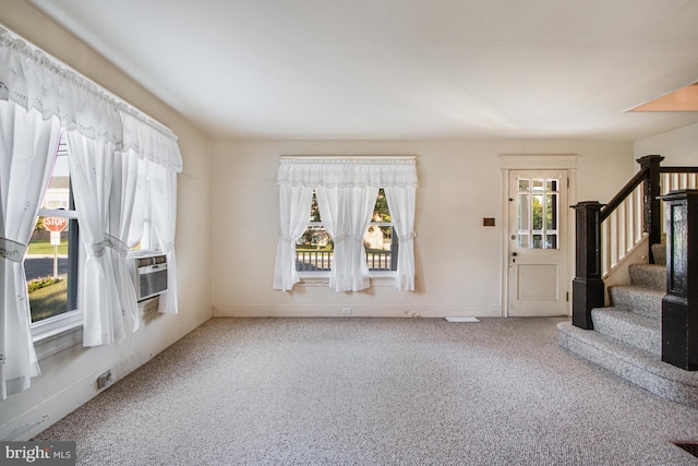 view of carpeted entrance foyer