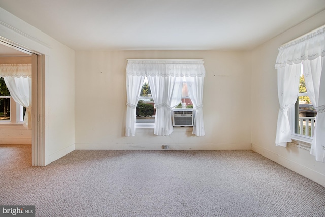 unfurnished room featuring carpet flooring