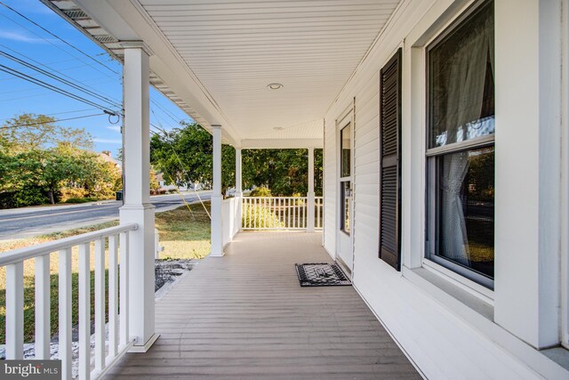 deck featuring covered porch