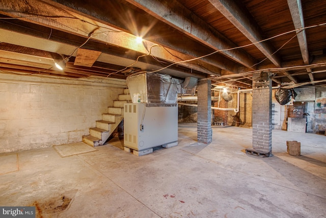 basement featuring heating unit