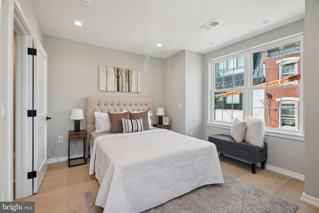 bedroom featuring light hardwood / wood-style flooring