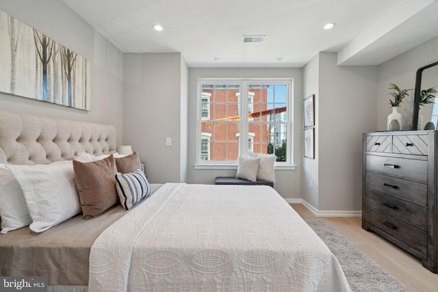 bedroom featuring light hardwood / wood-style flooring