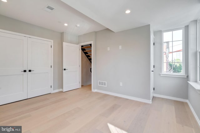 unfurnished bedroom featuring light hardwood / wood-style floors