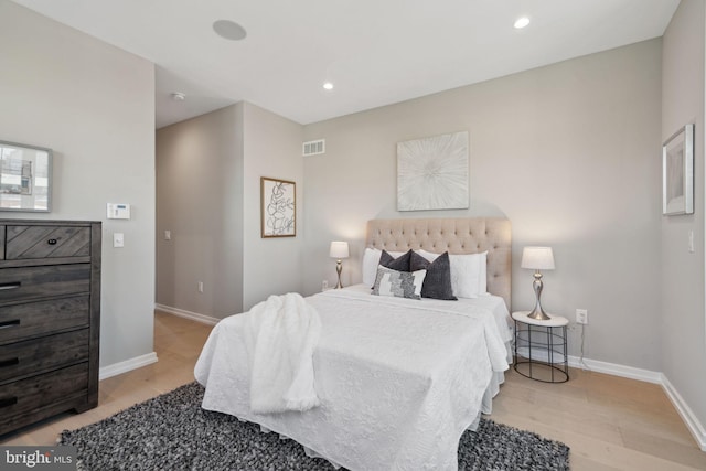 bedroom featuring light wood-type flooring