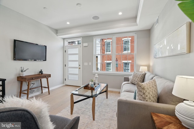 living room with light hardwood / wood-style flooring