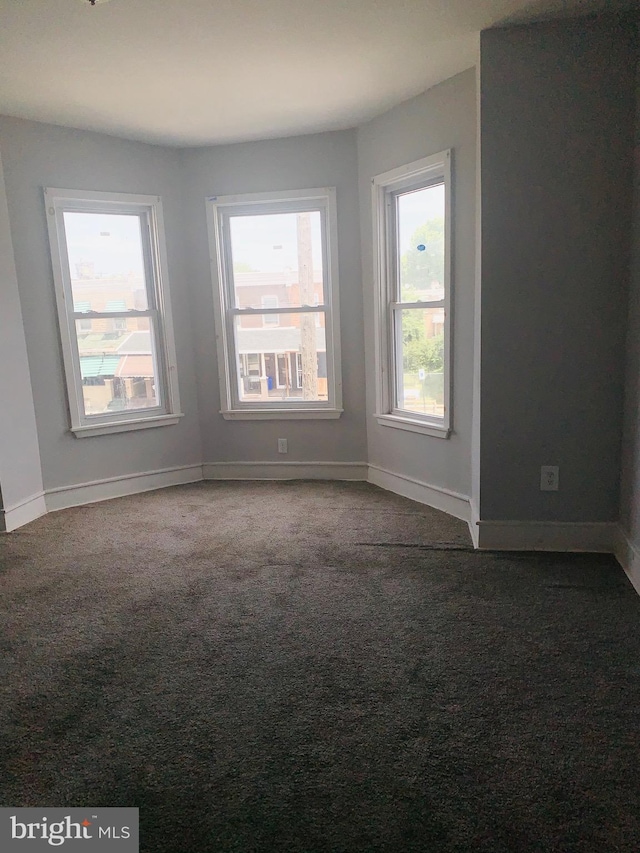 view of carpeted spare room