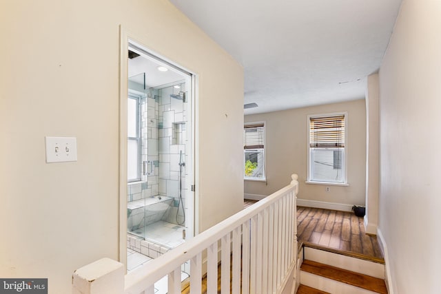 hallway featuring hardwood / wood-style floors