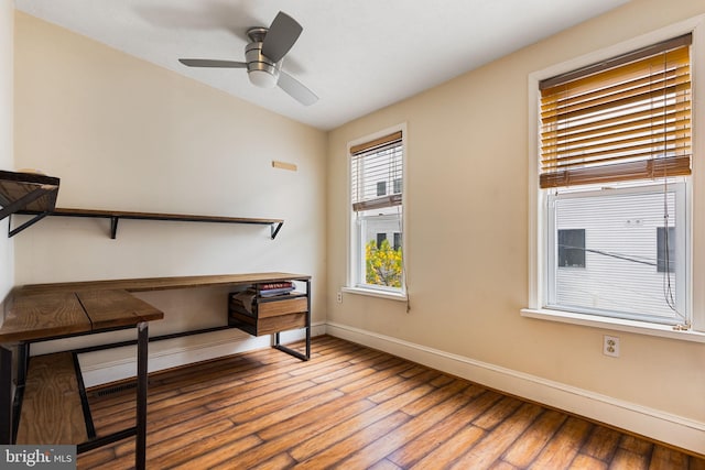 interior space with hardwood / wood-style flooring and ceiling fan