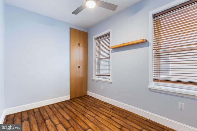 unfurnished room featuring ceiling fan and hardwood / wood-style floors