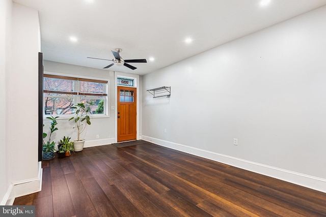 entrance foyer with ceiling fan and dark hardwood / wood-style flooring