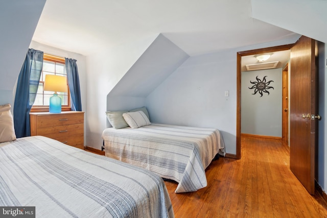 bedroom featuring hardwood / wood-style flooring