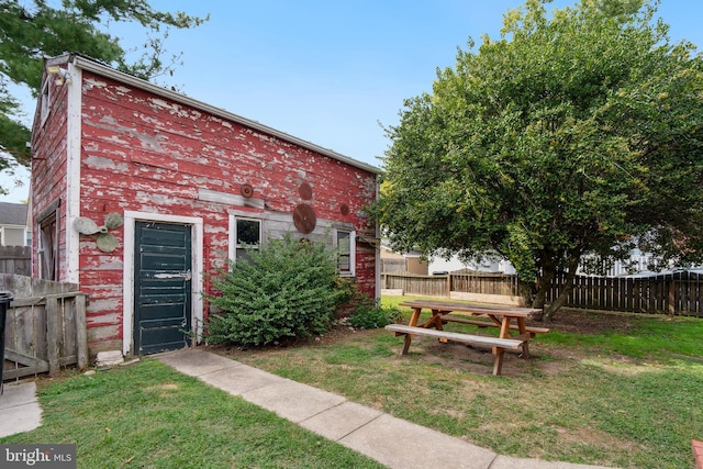 exterior space with a front yard