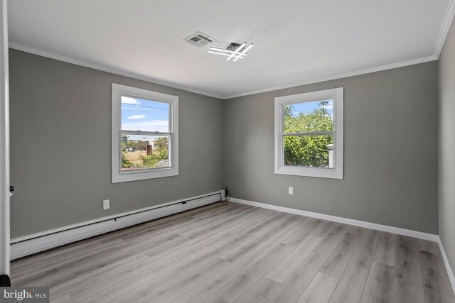 unfurnished room with light hardwood / wood-style flooring, a baseboard radiator, crown molding, and a healthy amount of sunlight