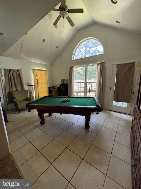 recreation room featuring light tile patterned floors, vaulted ceiling, ceiling fan, and billiards