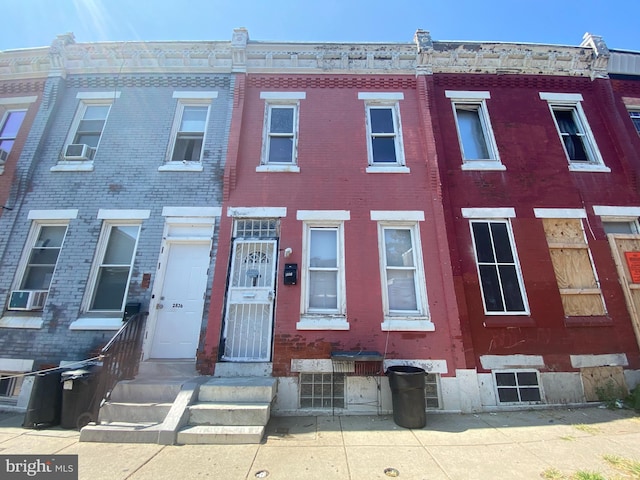 view of property with cooling unit