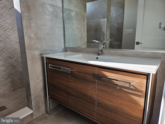 bathroom featuring vanity and walk in shower