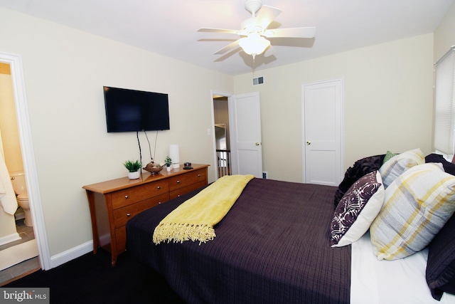 bedroom with ceiling fan and ensuite bathroom